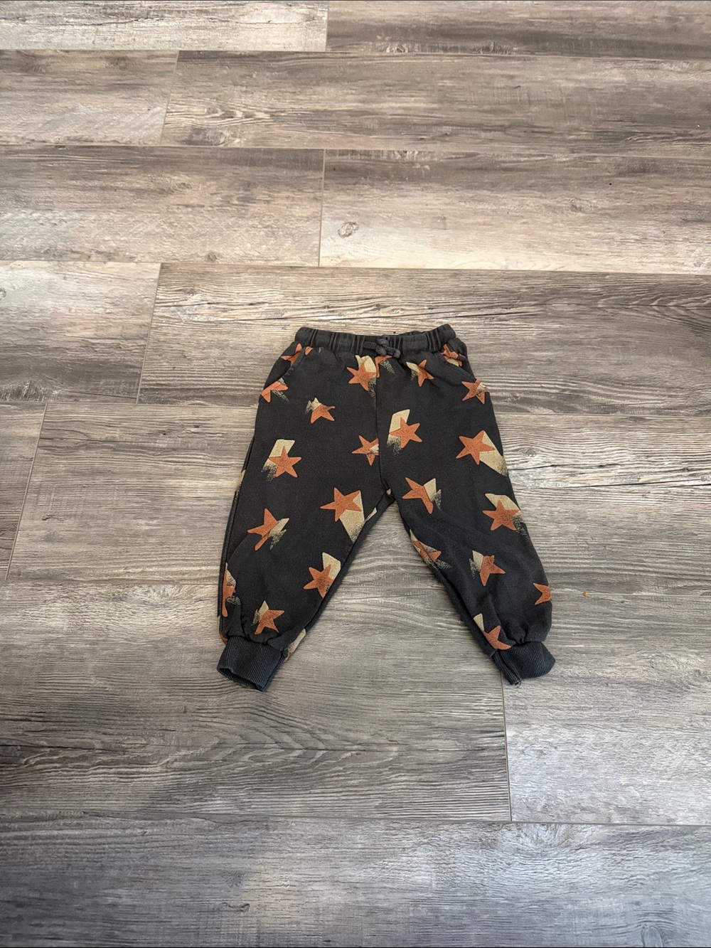 Zara Kids Black Jogger Pants with Orange Star Print